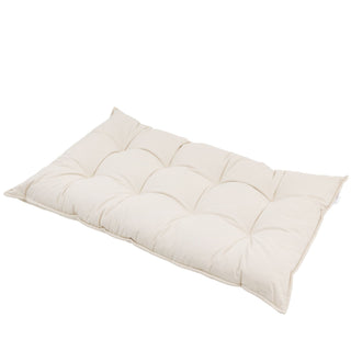 Beige quilted mattress topper on a white background