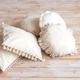 MINICAMP Throw Pillow with Grey Pom Poms in Ecru